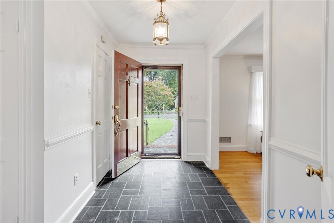 307 North Wilkinson Road Richmond, VA 23227 - Photo 5 of 48 Entrance foyer with ornamental molding