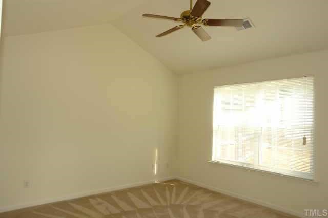 5525 Gateway Place Raleigh, NC 27617 - Photo 6 of 10 an empty room with a window