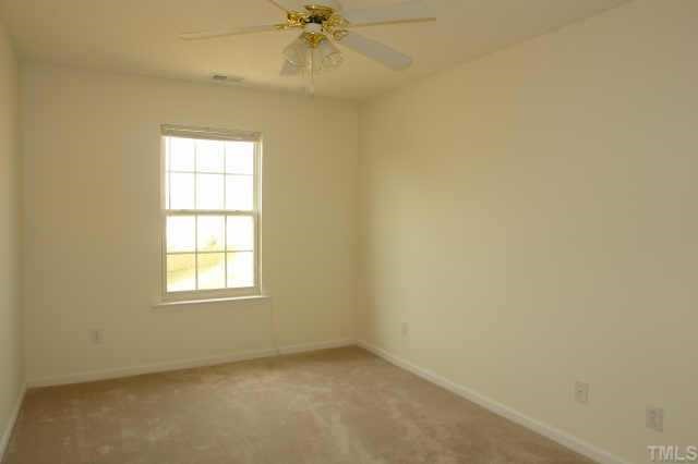 5525 Gateway Place Raleigh, NC 27617 - Photo 8 of 10 an empty room with a window