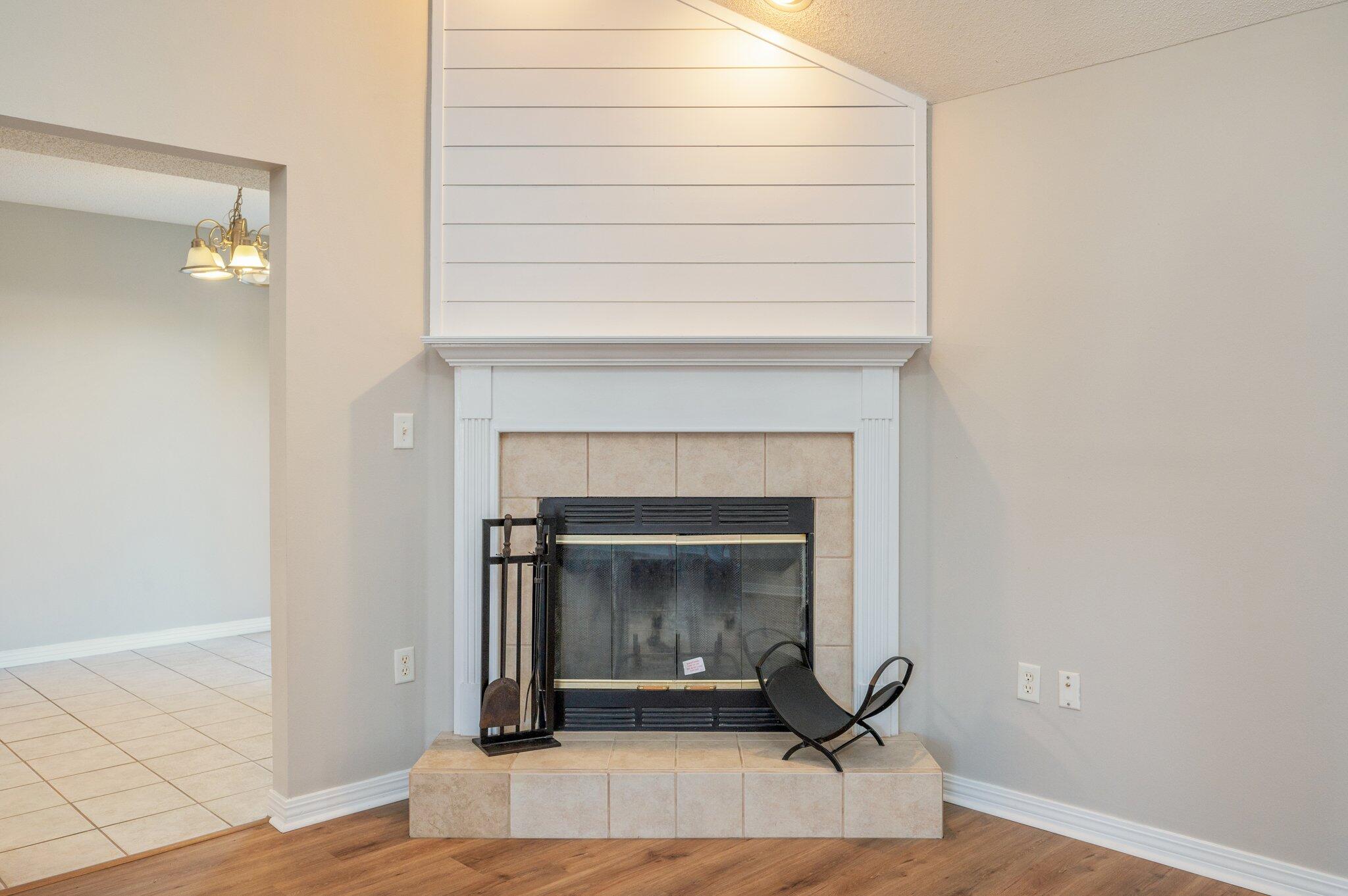 546 Tikell Drive Crestview, FL 32536 - Photo 12 of 20 a living room with a fireplace