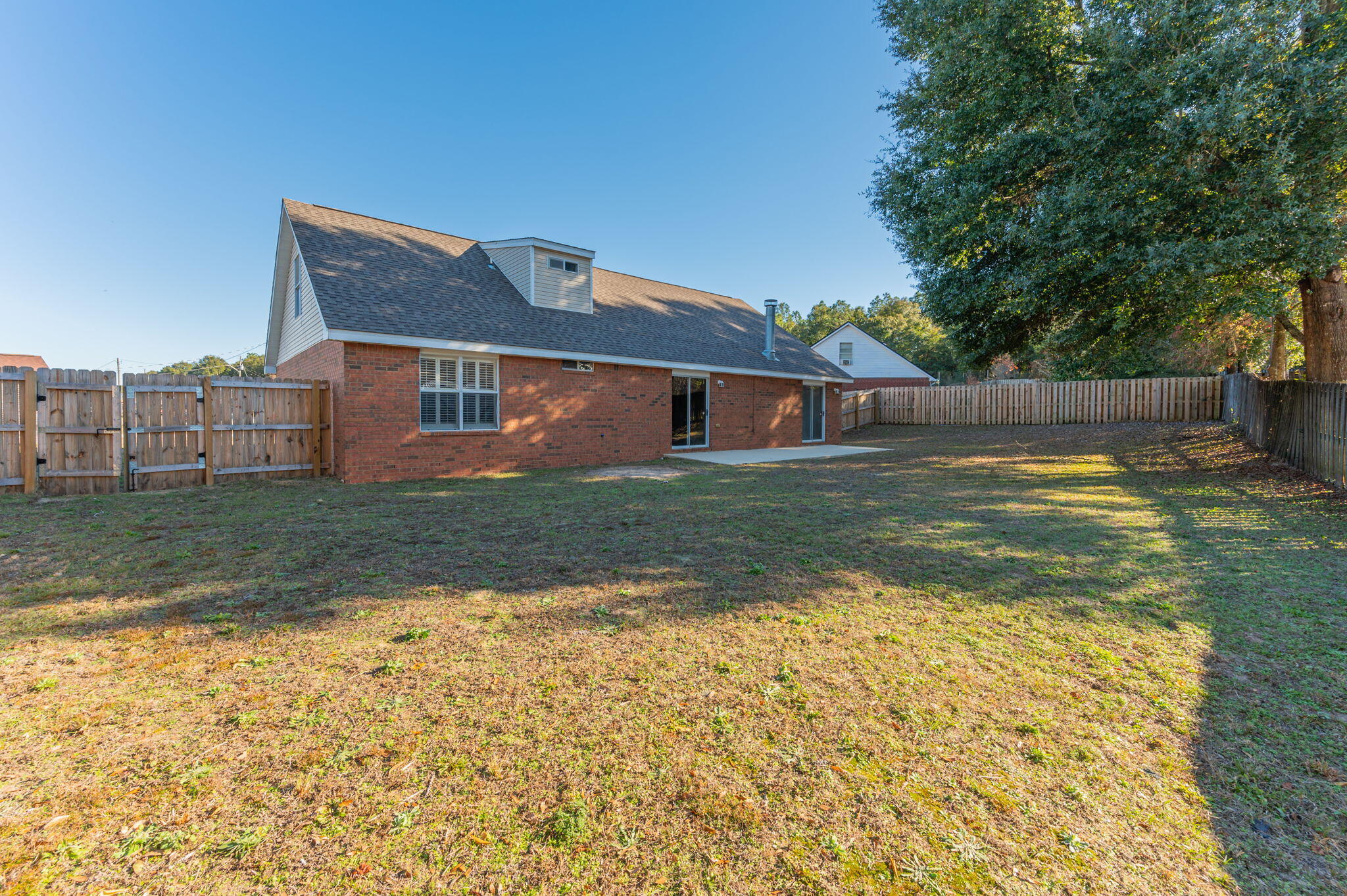 546 Tikell Drive Crestview, FL 32536 - Photo 2 of 20 a view of a house with a yard