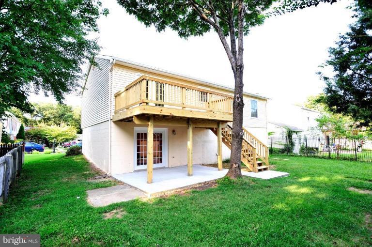 6806 Ben Franklin Road Springfield, VA 22150 - Photo 15 of 21 a view of a house with a yard
