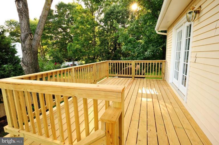 6806 Ben Franklin Road Springfield, VA 22150 - Photo 16 of 21 a view of balcony with wooden floor
