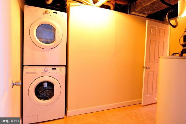 6806 Ben Franklin Road Springfield, VA 22150 - Photo 17 of 21 a utility room with dryer and washer