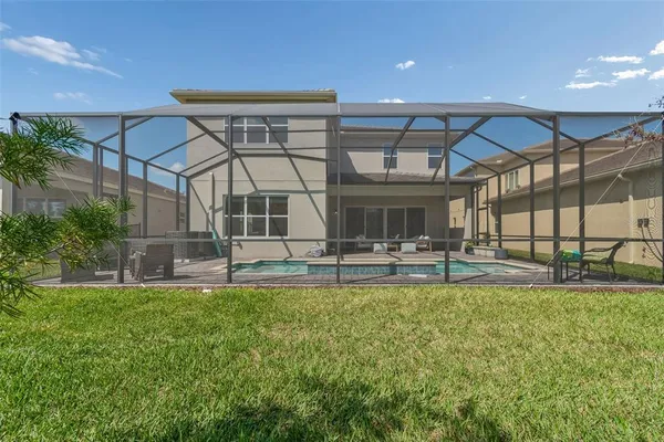 a view of a swimming pool with a patio