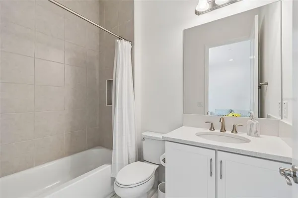 a view of a building with a floor to ceiling window