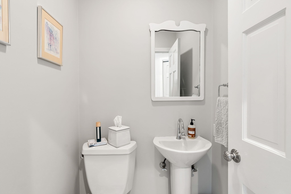 5 Fulton Road Andover, MA 01810 - Photo 14 of 27 a bathroom with a sink mirror and toilet