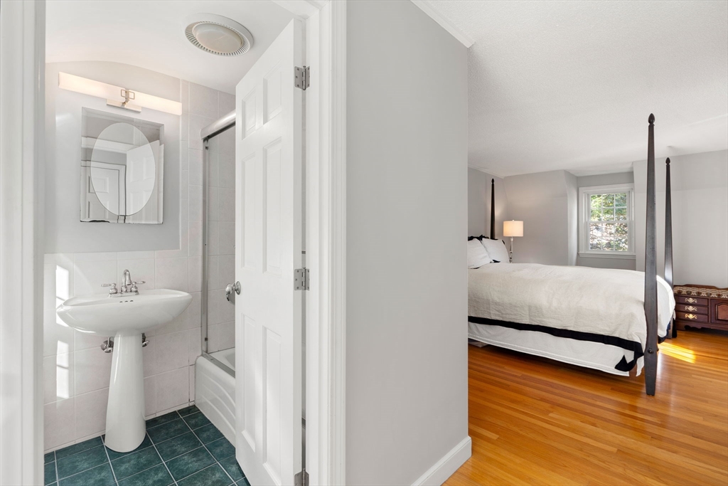 5 Fulton Road Andover, MA 01810 - Photo 17 of 27 a en suite bathroom with a sink and a mirror