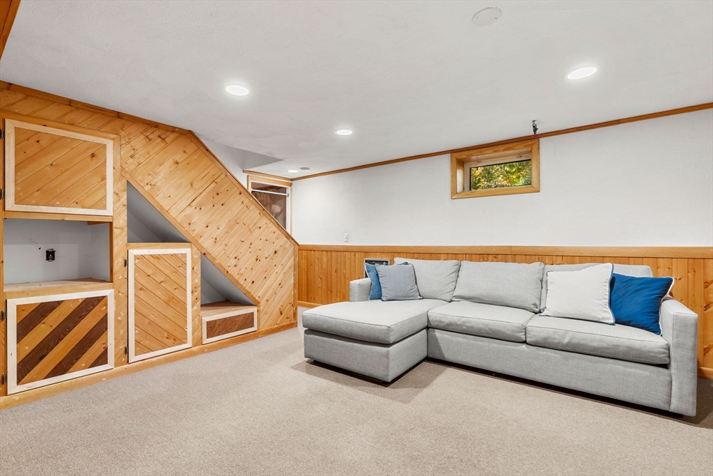 5 Fulton Road Andover, MA 01810 - Photo 21 of 27 a living room with furniture and a ceiling fan