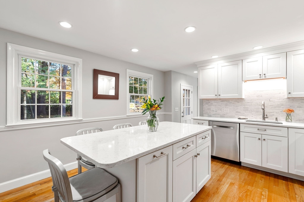 5 Fulton Road Andover, MA 01810 - Photo 5 of 27 a kitchen with a sink cabinets and wooden floor