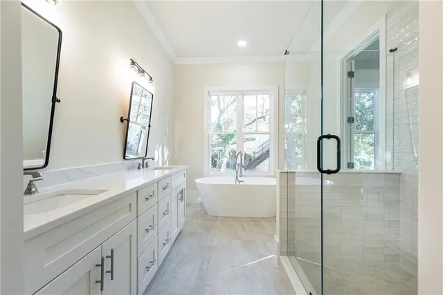 a view of a hallway with the view of kitchen and dining room view