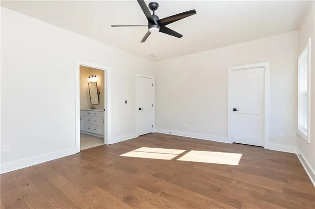 a bathroom with a double vanity sink mirror and
