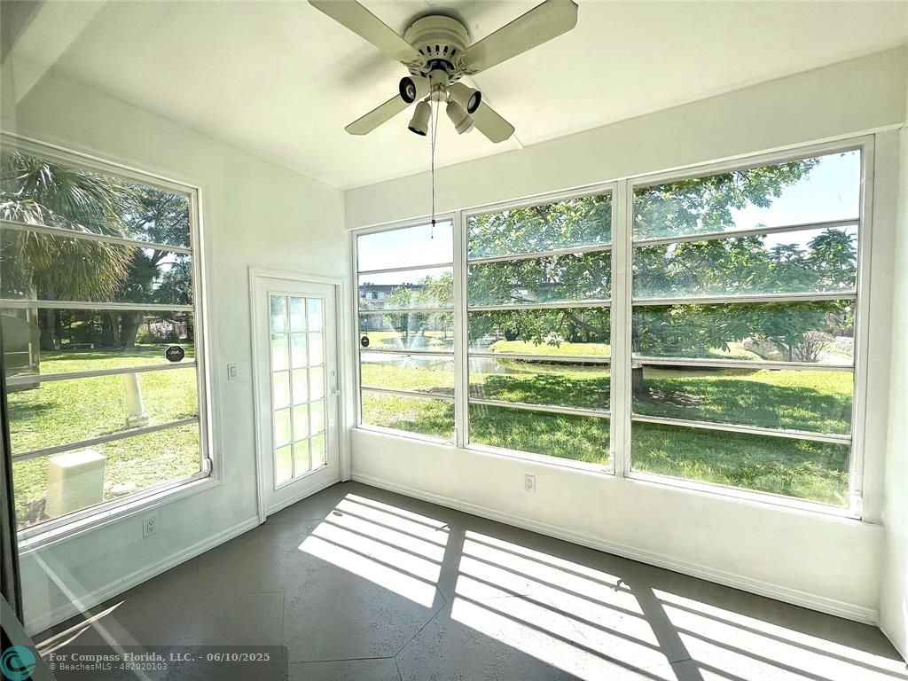 5001 West Oakland Park Boulevard, Unit 111 Lauderdale Lakes, FL 33313 - Photo 14 of 38 a view of a room with a large window