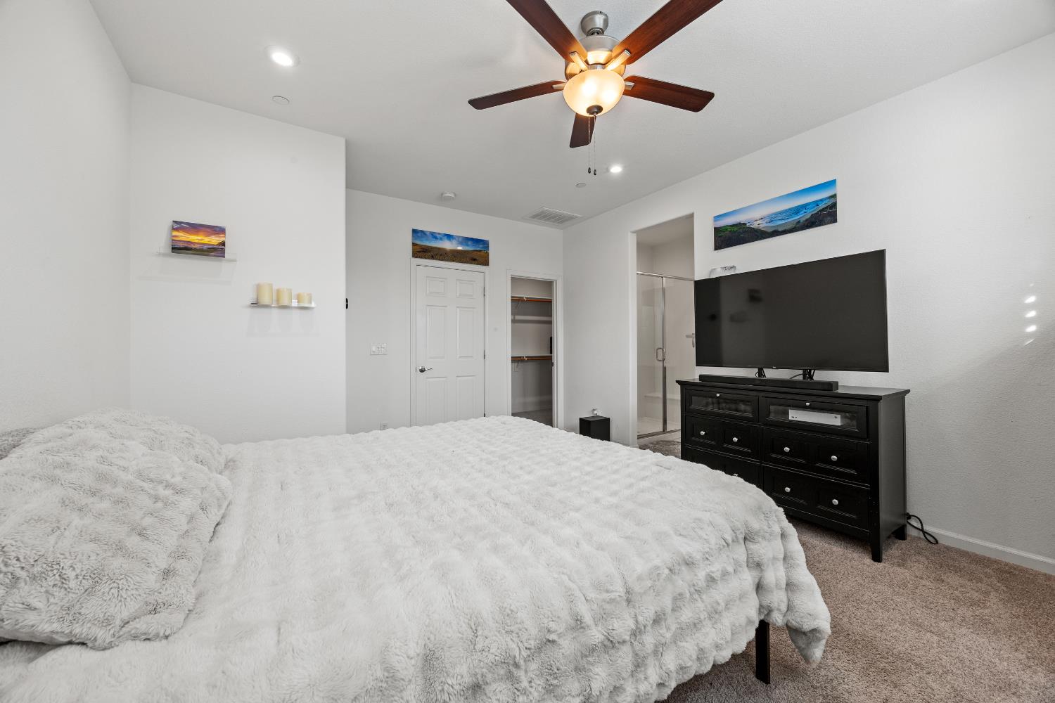 1048 Knox Way Roseville, CA 95747 - Photo 23 of 29 a bedroom with a bed and a flat screen tv