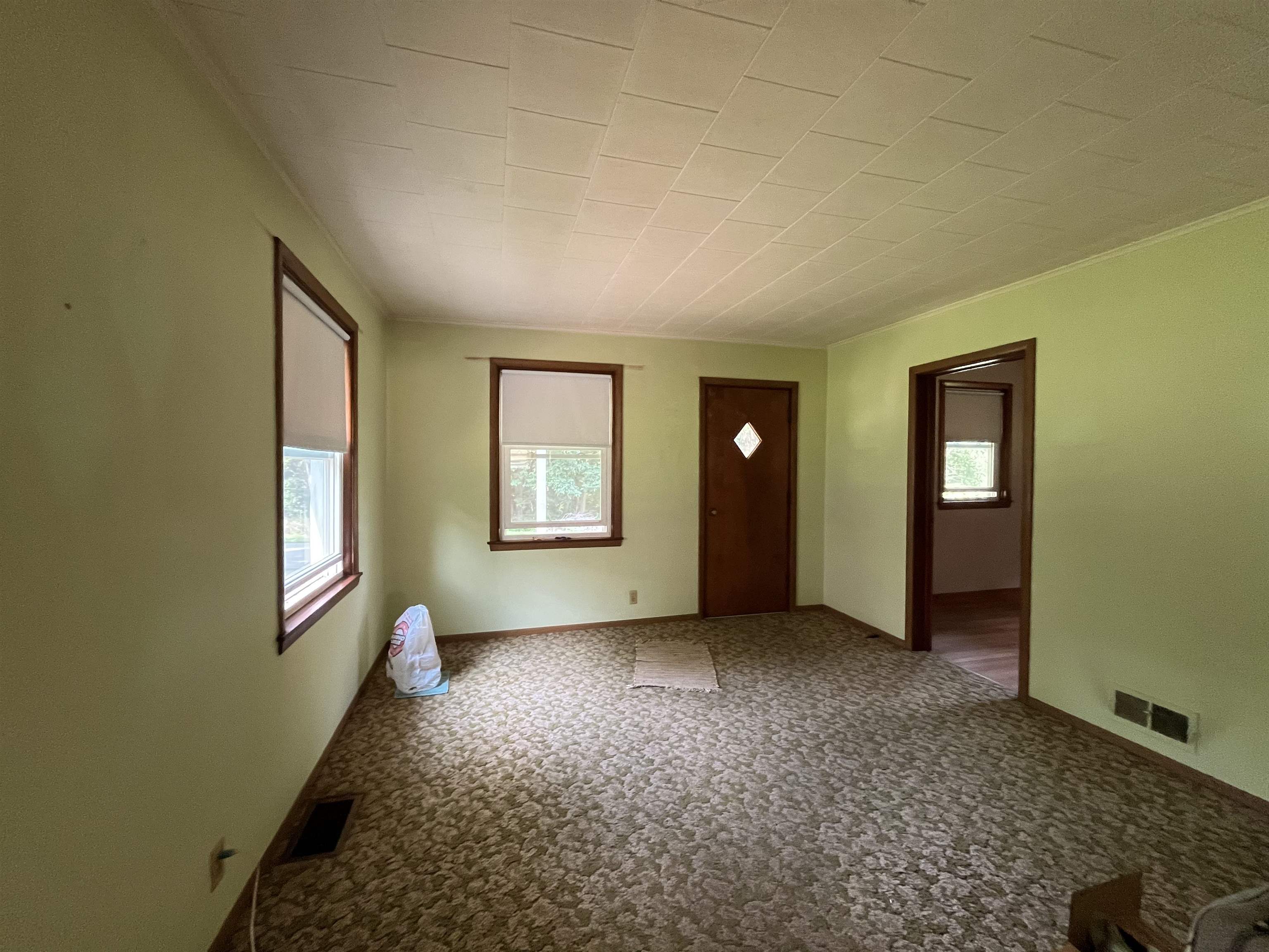 113 3rd Street Mark, IL 61326 - Photo 7 of 9 an empty room with windows and closet