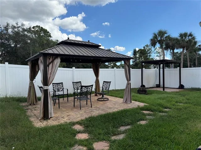 a garden view with a sitting space