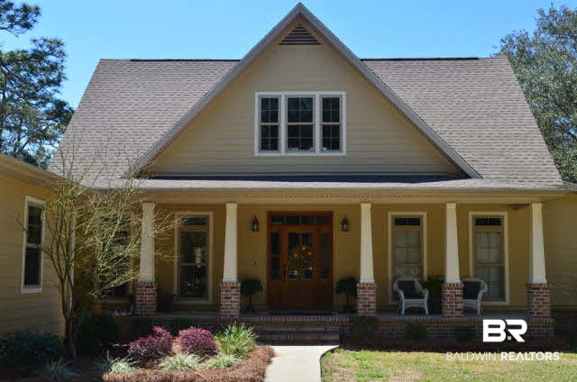 8919 Red Fish Pt Road Lillian, AL 36549 - Photo 2 of 46 Hardi-board exterior w/brick accent columns.