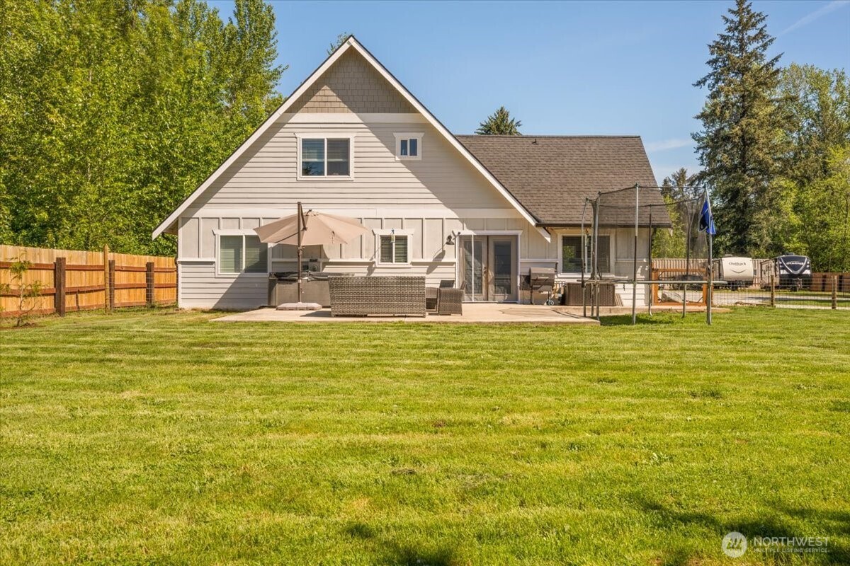 26709 Entwhistle Road East Buckley, WA 98321 - Photo 30 of 40 a view of a house with a swimming pool