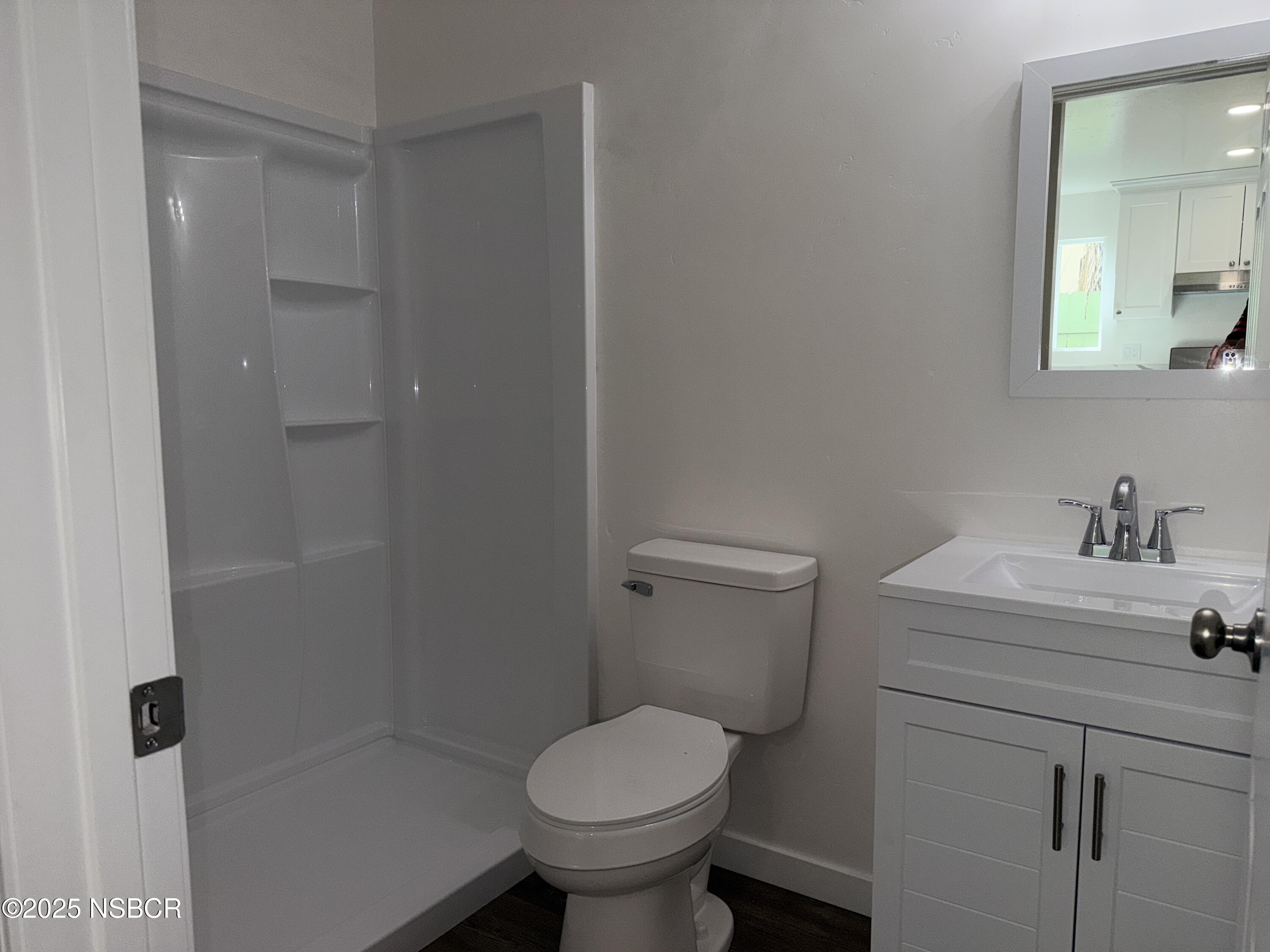 2742 Niverth Place Santa Maria, CA 93455 - Photo 20 of 23 a bathroom with a sink toilet and a mirror