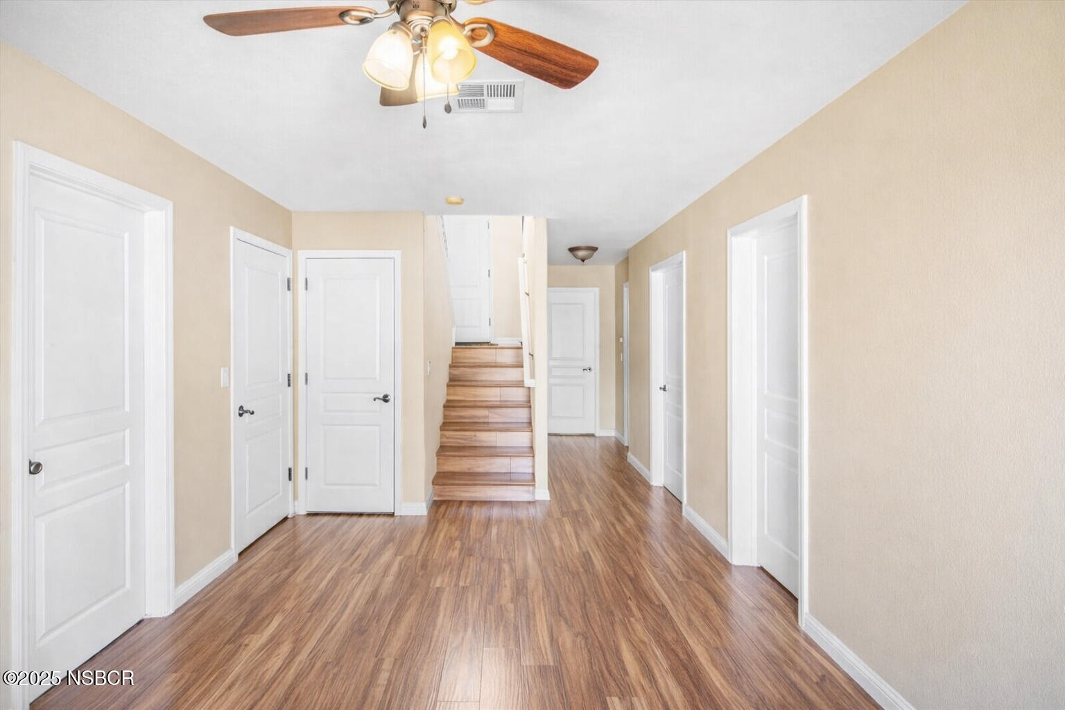 2742 Niverth Place Santa Maria, CA 93455 - Photo 9 of 23 a view of a hallway with wooden floor