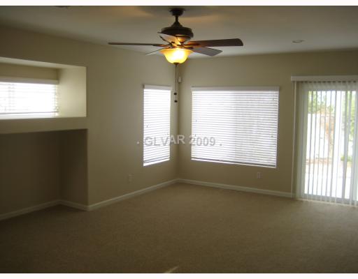 1644 Rugged Ravine Court Las Vegas, NV 89183 - Photo 4 of 11 Living Room. Media niche in living room! New custom blinds throughout!