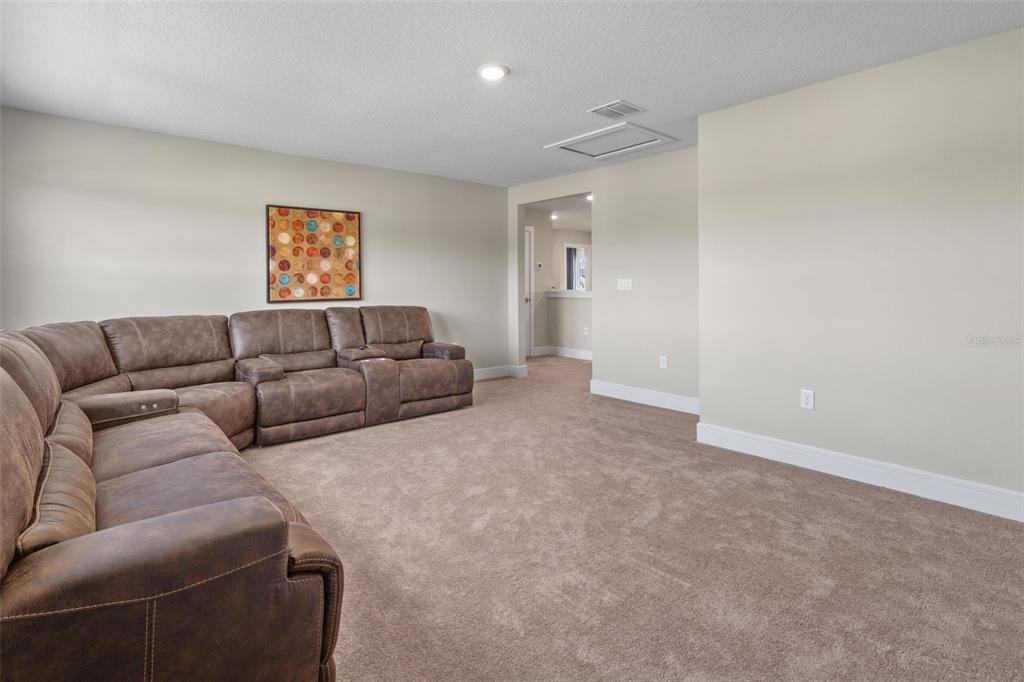 15203 Willow Ridge Drive Montverde, FL 34756 - Photo 40 of 51 a living room with furniture and a couch