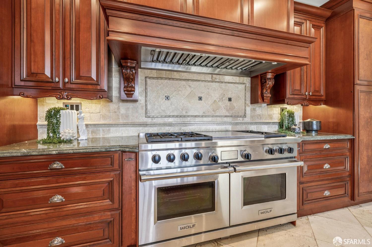 729 Douglass Street San Francisco, CA 94114 - Photo 15 of 92 a stove top oven sitting inside of a kitchen