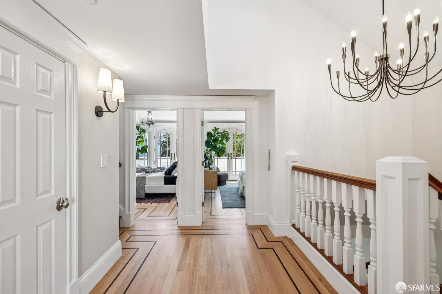 729 Douglass Street San Francisco, CA 94114 - Photo 37 of 92 a view of a hallway with wooden floor and staircase