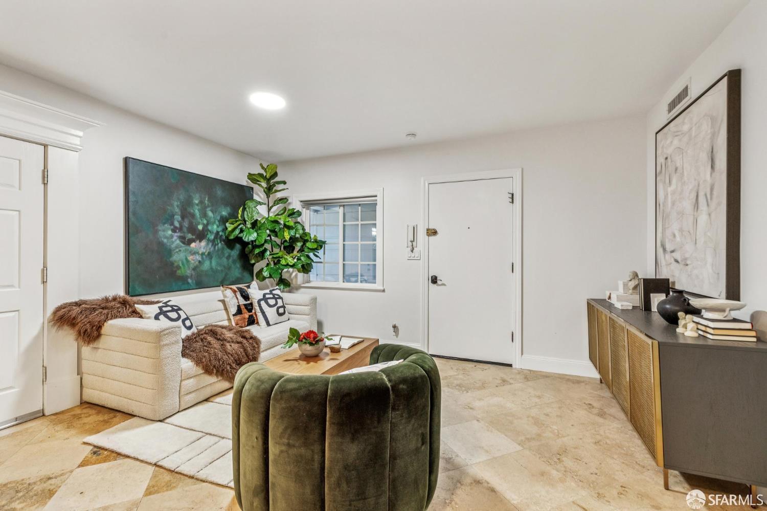 729 Douglass Street San Francisco, CA 94114 - Photo 80 of 92 a bedroom with bed and a flat screen tv