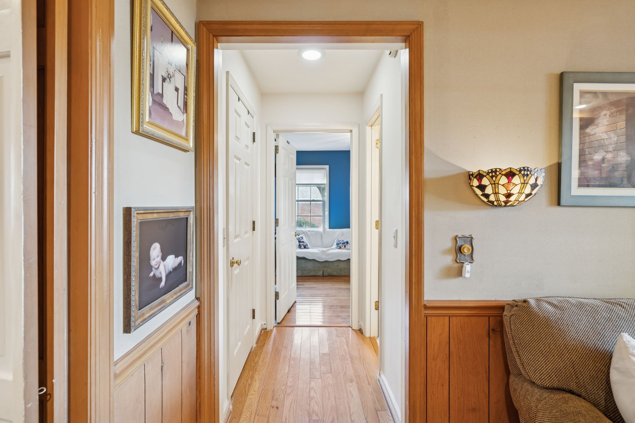 129 West Ridge Drive Hendersonville, TN 37075 - Photo 17 of 44 a view of a hallway view with wooden floor and staircase