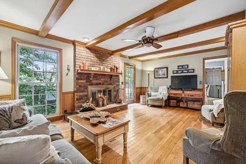 a workspace with furniture and a window