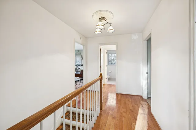 a view of a bedroom from a hallway