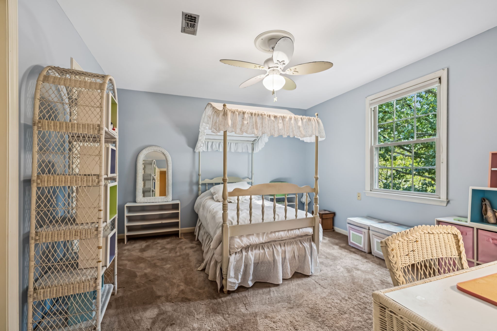 129 West Ridge Drive Hendersonville, TN 37075 - Photo 23 of 44 a bedroom with a bed and a chandelier
