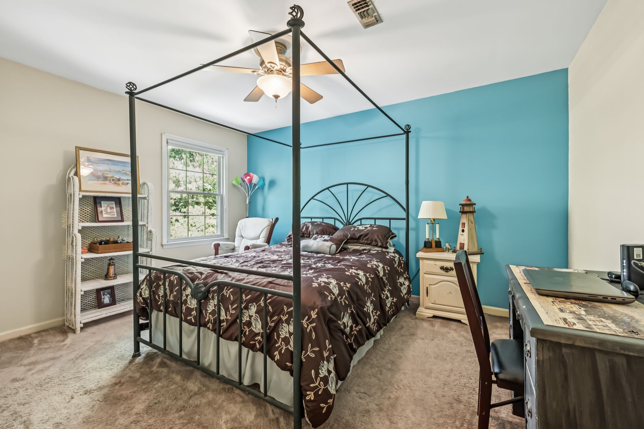 129 West Ridge Drive Hendersonville, TN 37075 - Photo 25 of 44 a bedroom with a bed next to a window