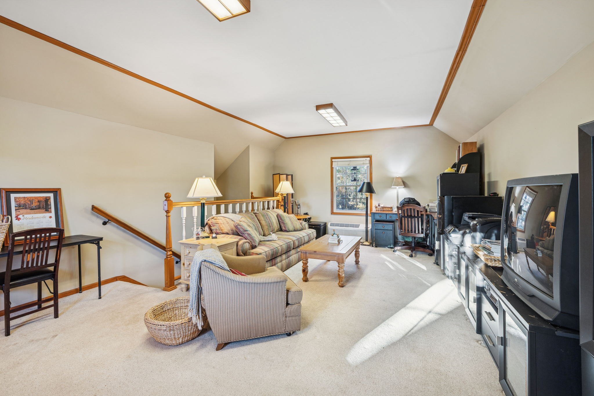 129 West Ridge Drive Hendersonville, TN 37075 - Photo 28 of 44 a living room with furniture and a flat screen tv