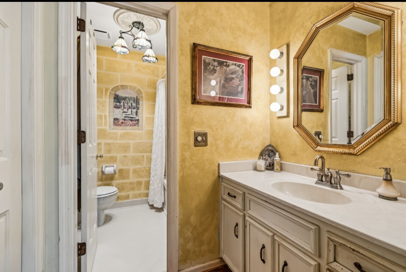 129 West Ridge Drive Hendersonville, TN 37075 - Photo 29 of 44 a bathroom with a sink vanity and a mirror