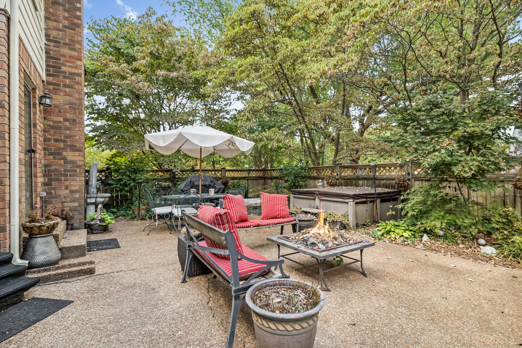 129 West Ridge Drive Hendersonville, TN 37075 - Photo 36 of 44 an outdoor space with furniture and umbrella