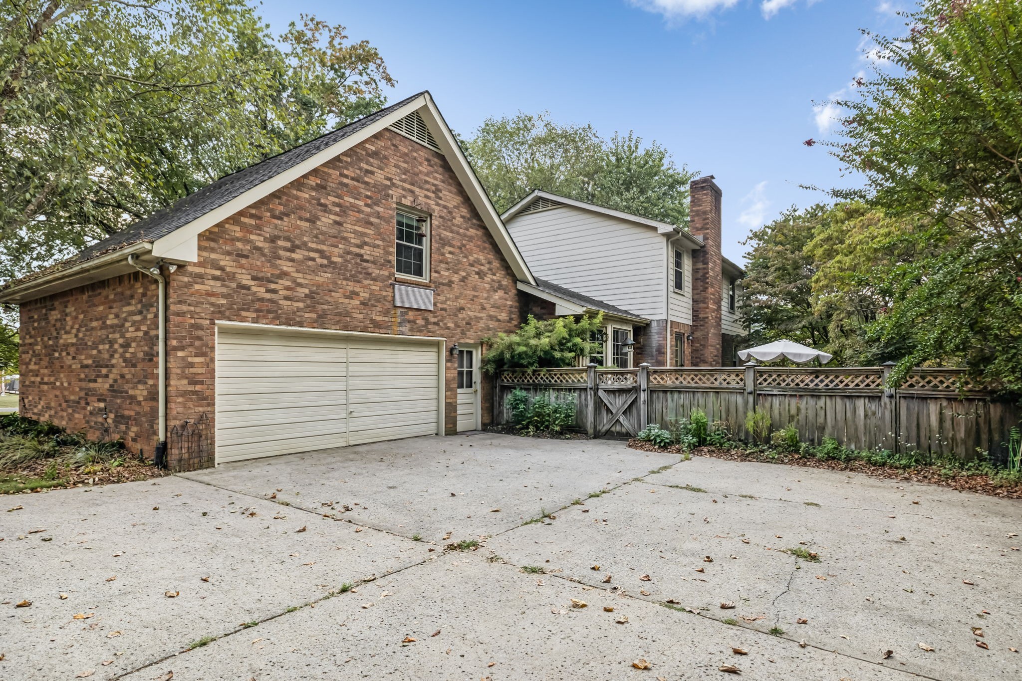 129 West Ridge Drive Hendersonville, TN 37075 - Photo 37 of 44 a view of a house with a small yard next to a road