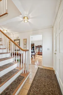 a view of living room with wooden floor