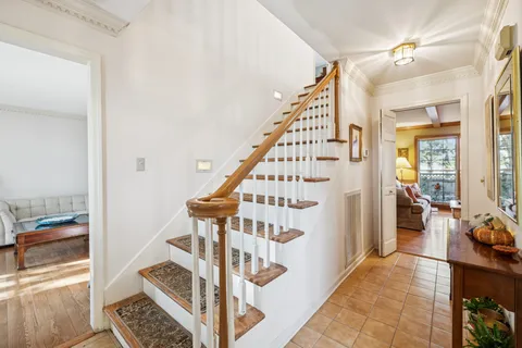 a view of entryway with wooden floor