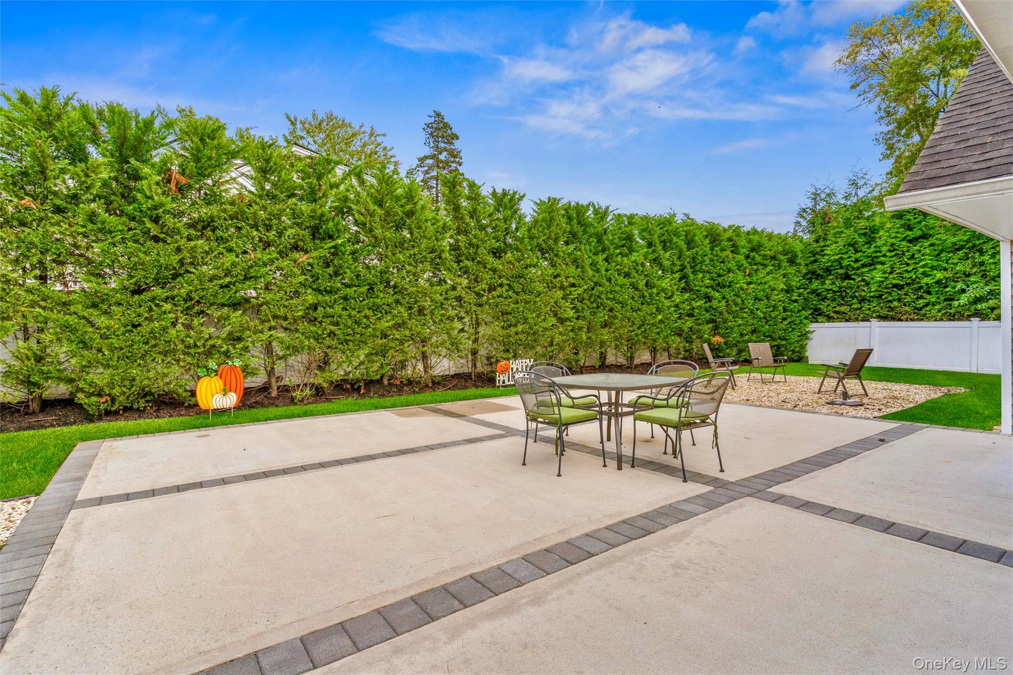 262 Channon Road Hewlett, NY 11557 - Photo 13 of 27 a swimming pool with outdoor seating and yard