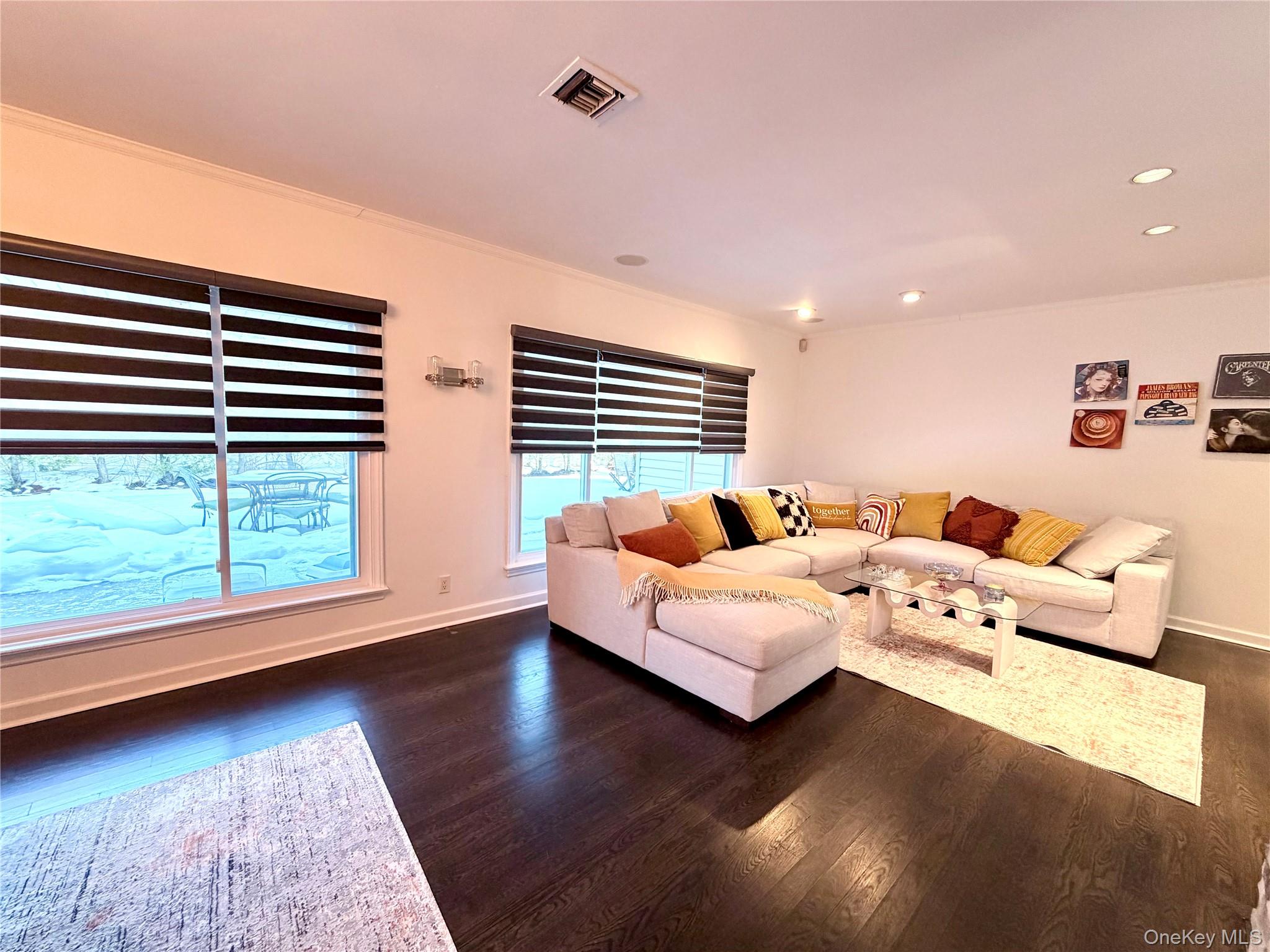 262 Channon Road Hewlett, NY 11557 - Photo 15 of 27 a living room with furniture and a large window
