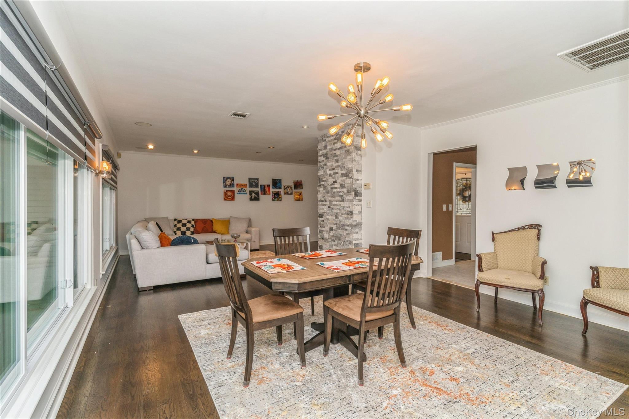 262 Channon Road Hewlett, NY 11557 - Photo 18 of 27 a dining room with furniture and window