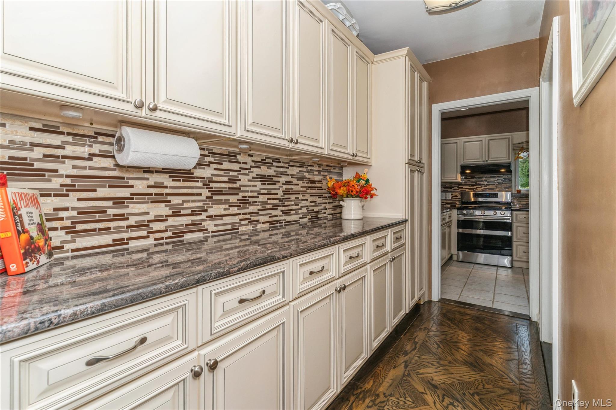 262 Channon Road Hewlett, NY 11557 - Photo 21 of 27 a kitchen with sink and cabinets