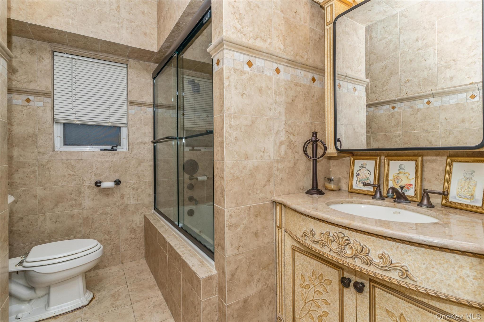 262 Channon Road Hewlett, NY 11557 - Photo 27 of 27 a bathroom with a granite countertop sink toilet and shower