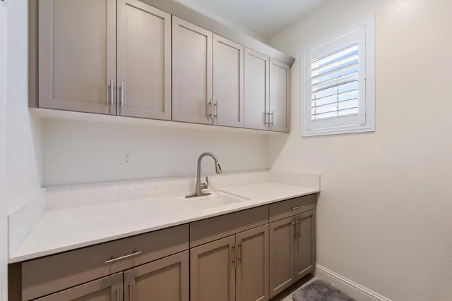 a sink with cabinets