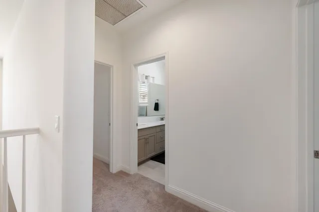 a bathroom with a sink and mirror