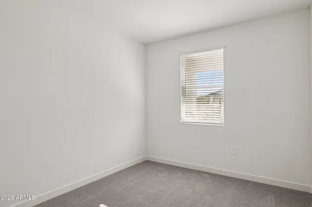 an empty room and closet area