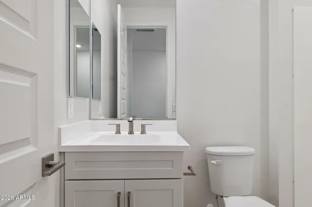 a bathroom with a sink a toilet and a bathtub