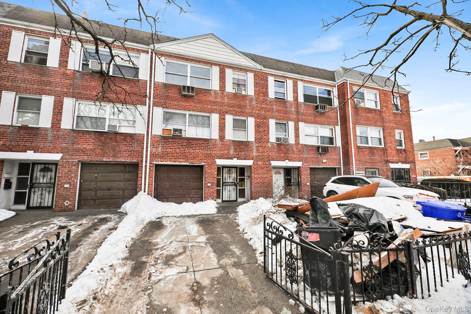 77-06 25th Avenue Queens, NY 11370 - Photo 1 of 1 a view of a brick building with many windows